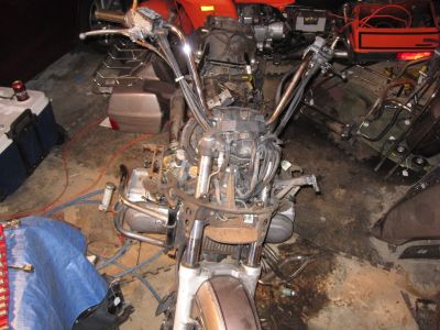 Front faring removed.  All that remains of the bodywork is the metal fender over the rear wheel and the front fender.  The front fender is unbolted, but the wheel needs to come off in order to drop the bodywork.
Keywords: 1984;goldwing;gl1200